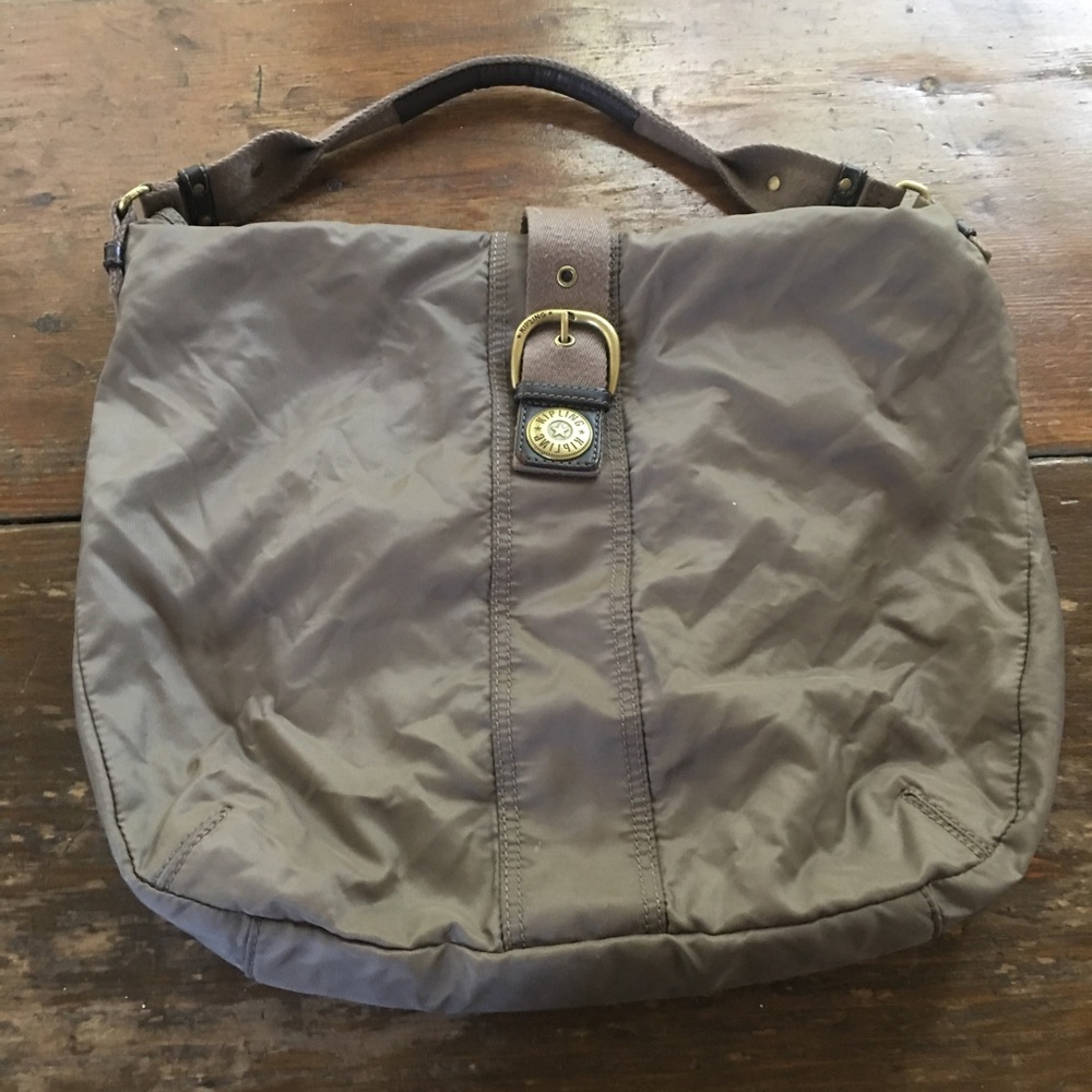 Tan Kipling purse